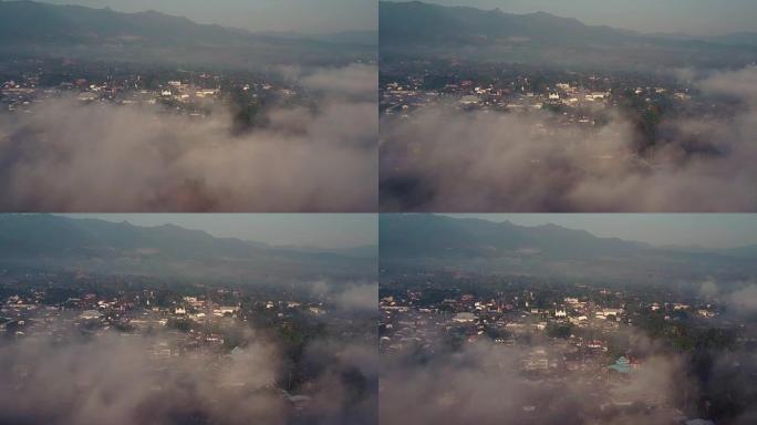 雾蒙蒙的小村庄的鸟瞰图。