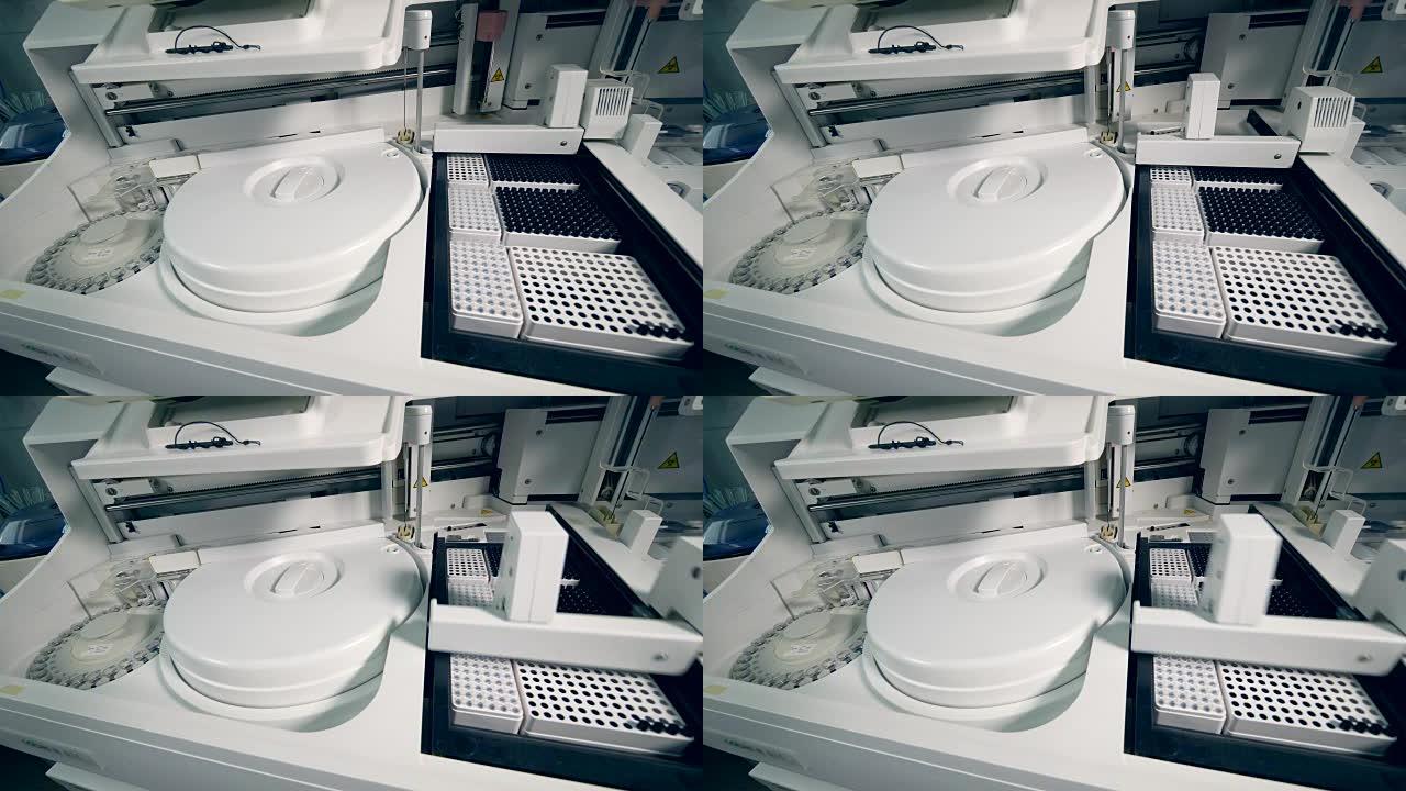 在制药厂处理样品的自动化制药机器。4K。