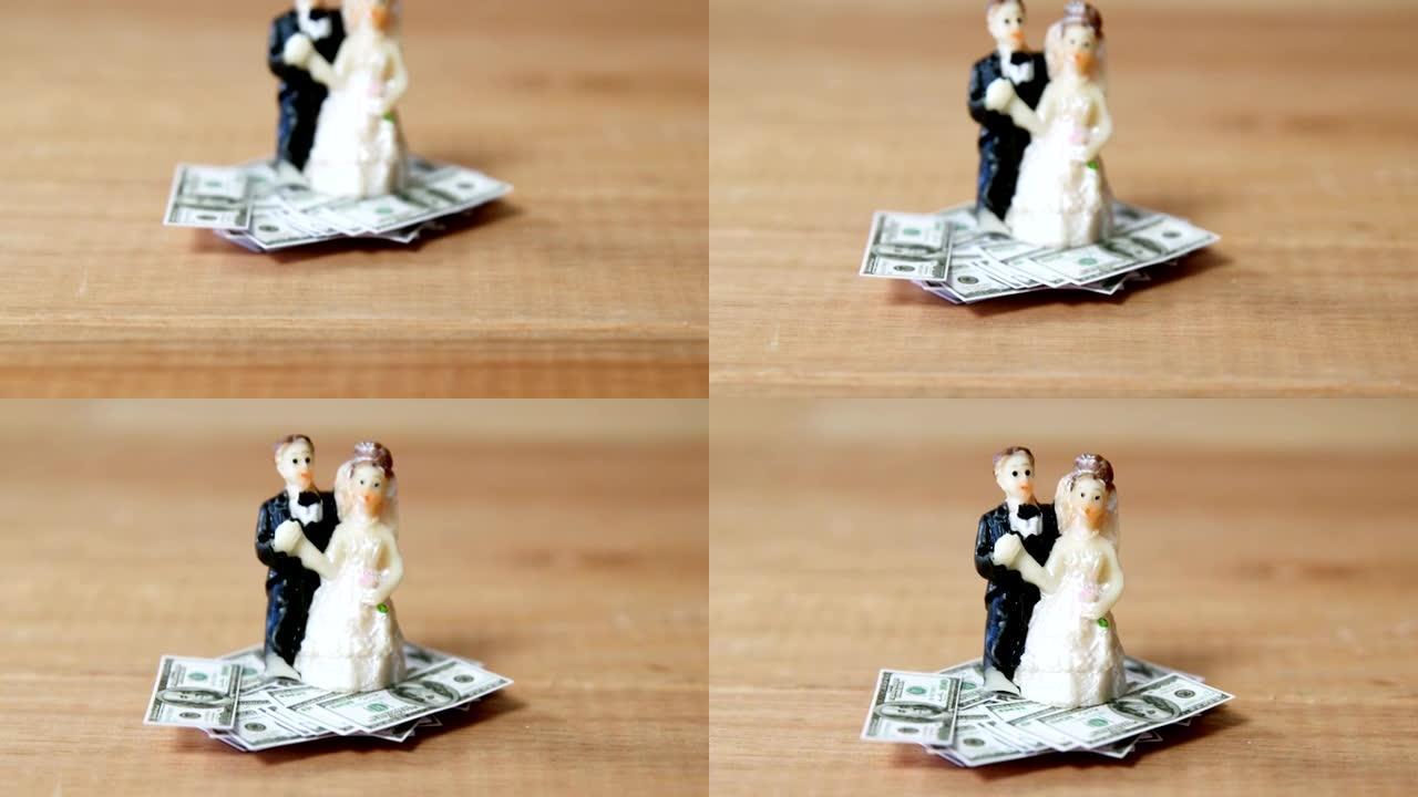 微型新娘夫妇保持美元
