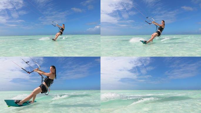 慢动作: 快乐微笑的冲浪女孩在美丽的海面上冲浪