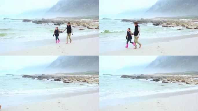 兄弟姐妹在海边散步