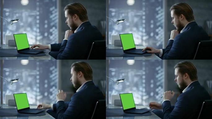 年轻而有远见的商人坐在他的桌子旁，在带有绿色模拟屏幕的笔记本电脑上打字。她的办公室看起来很现代，带有