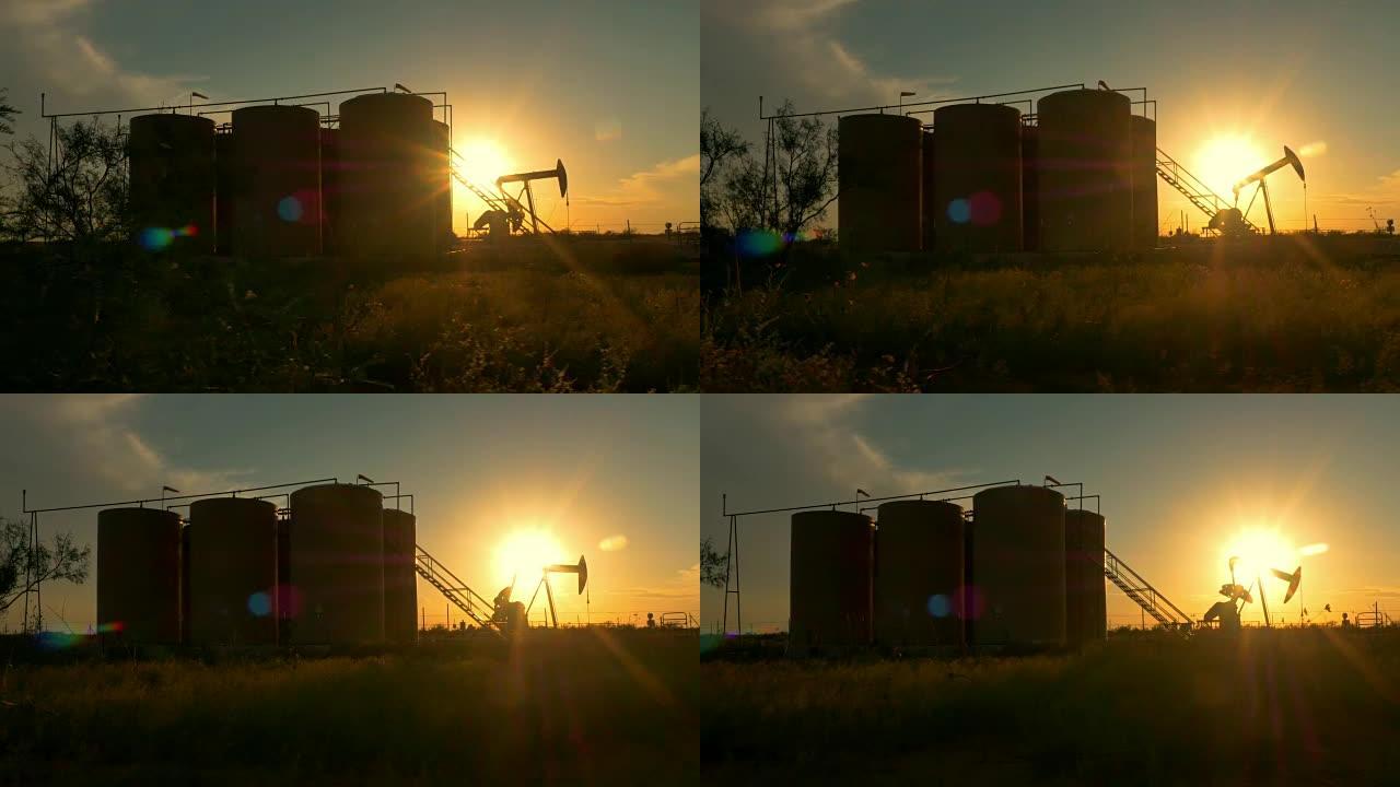 工业千斤顶泵平台在日落太阳下泵送原油