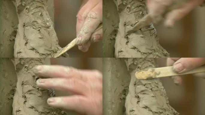高清: 艺术家手造型粘土