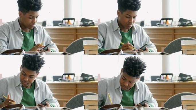一名高中男生在校图书馆为数学考试而学习