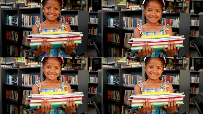 快乐女学生站在书堆4k的肖像
