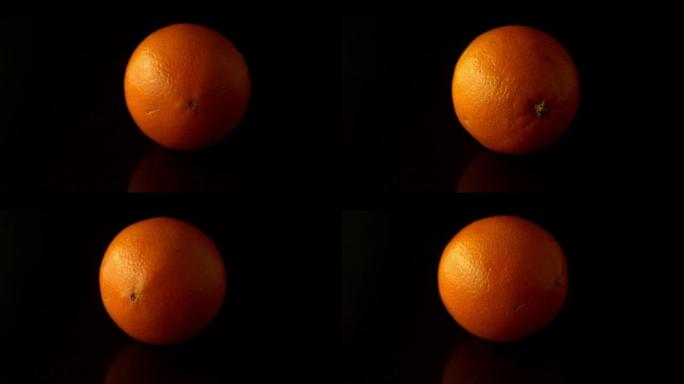 橙色在黑色表面上旋转