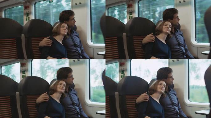 夫妻俩一起乘火车旅行