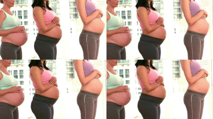 站在健身工作室的孕妇