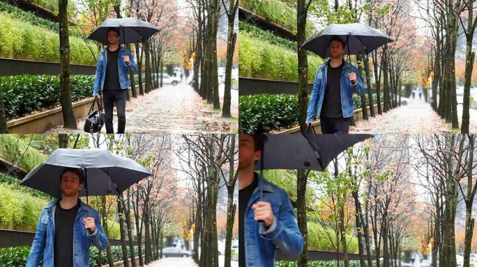 男子拿着雨伞走在街上