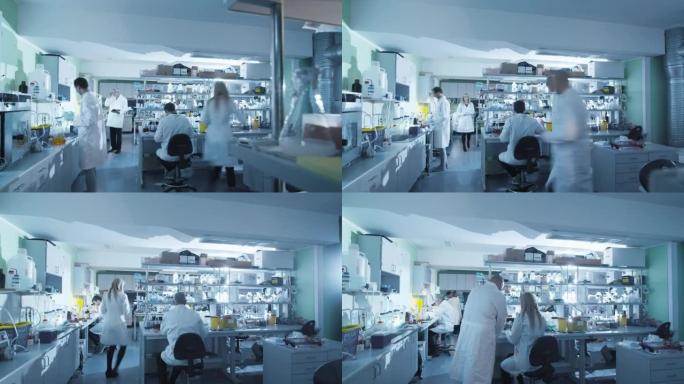 一组穿着白大褂的科学家在现代实验室工作的延时镜头。