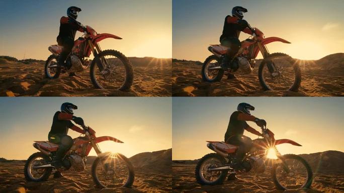 低角度拍摄的专业摩托车越野赛车手坐在他的FMX摩托车扭转全油门把手，并开始骑这极端的越野地形轨道