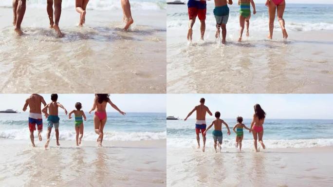 幸福的家庭奔向海浪