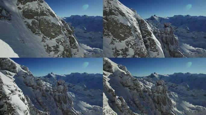 Aerial view of snow covered mountain range with be