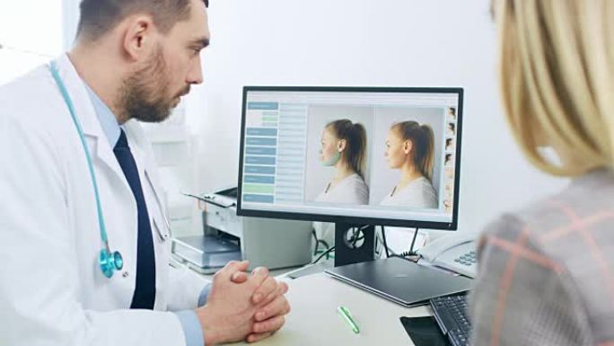 整形/美容外科医生向妇女咨询有关面部拉皮手术的信息，他指向计算机屏幕，显示可用的整容，额头拉皮，颊骨