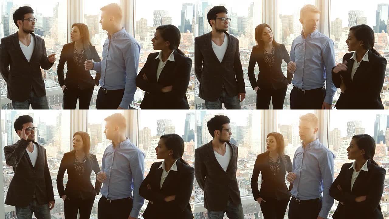 团队合作: 创业企业家庆祝他们在办公室的成功。职业环境中开朗的商界人士和商界女性。