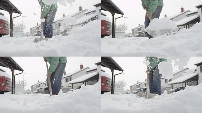 特写: 居民从人行道和前院清洁新鲜的冬季积雪