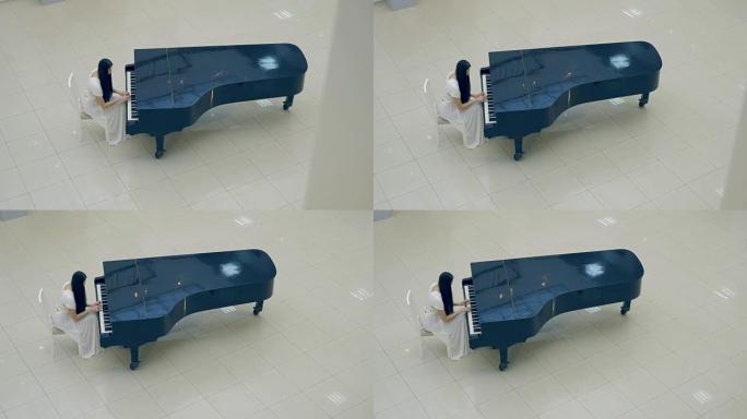 音乐家在弹钢琴。没有脸。4K。