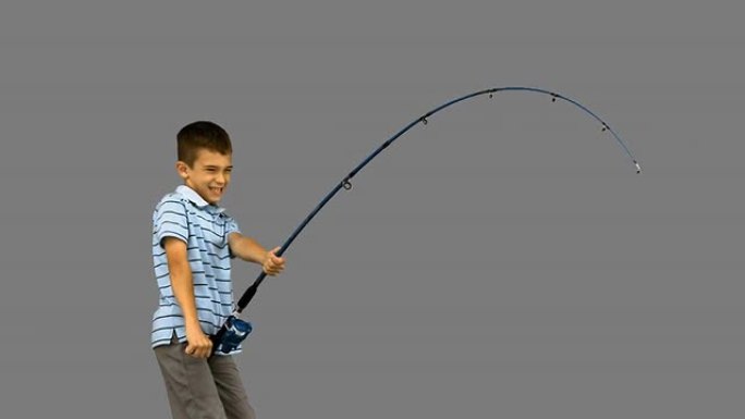在灰色屏幕上钓鱼的小男孩