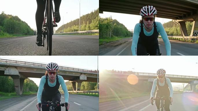 骑自行车的女骑车人在高速公路桥下骑行