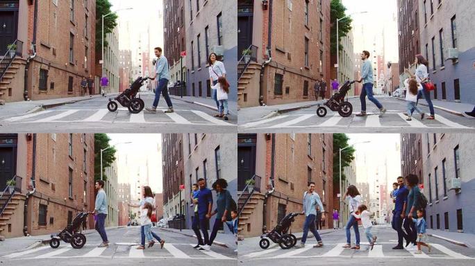 布鲁克林的两个年轻家庭过马路