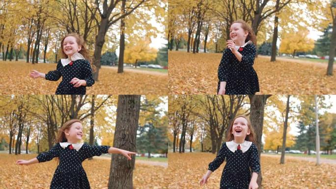 肖像可爱的卷发小女孩，穿着圆点连衣裙，在公园里的秋天小巷里流淌