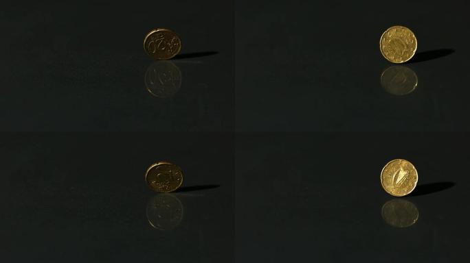 欧元硬币在黑色表面上旋转