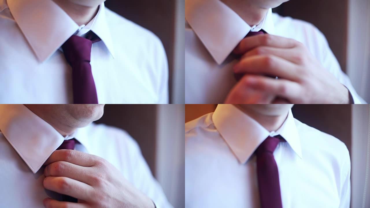 一个男人的特写拉直领带