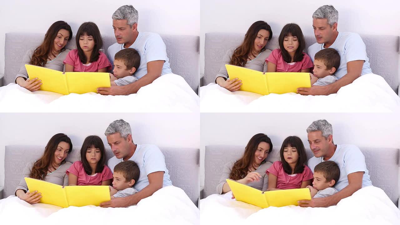 家人在床上读故事