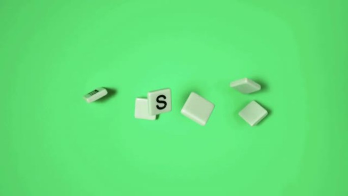 塑料字母在绿色表面弹跳和拼写复活节