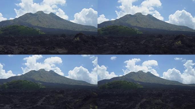 空中，眩晕效应: 巴厘岛巴图尔山的火山黑色熔岩岩石景观