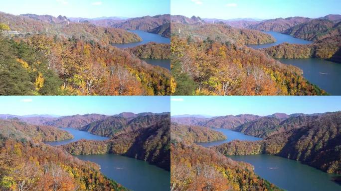 平移镜头: 日本福岛忠达美市高野红叶森林在田仓大坝上方的湖泊视点