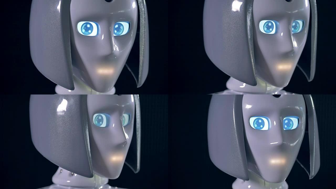 一个有着大眼睛的女性机器人头。