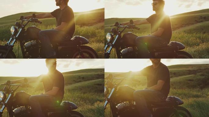 日落时骑着老式摩托车的人