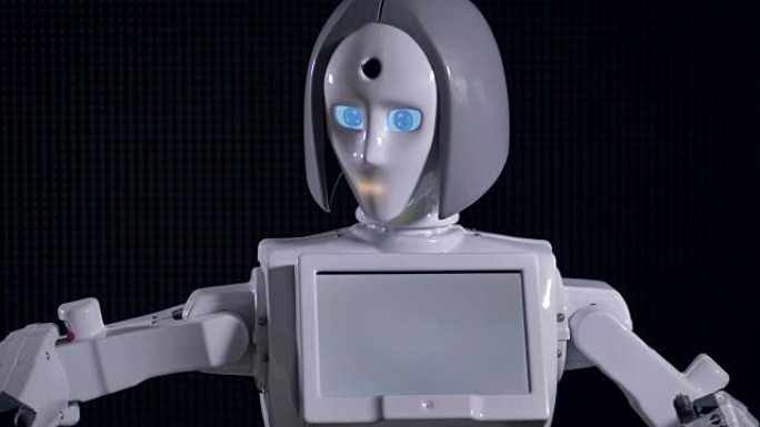 一个白色机器人展示了它如何移动手臂。