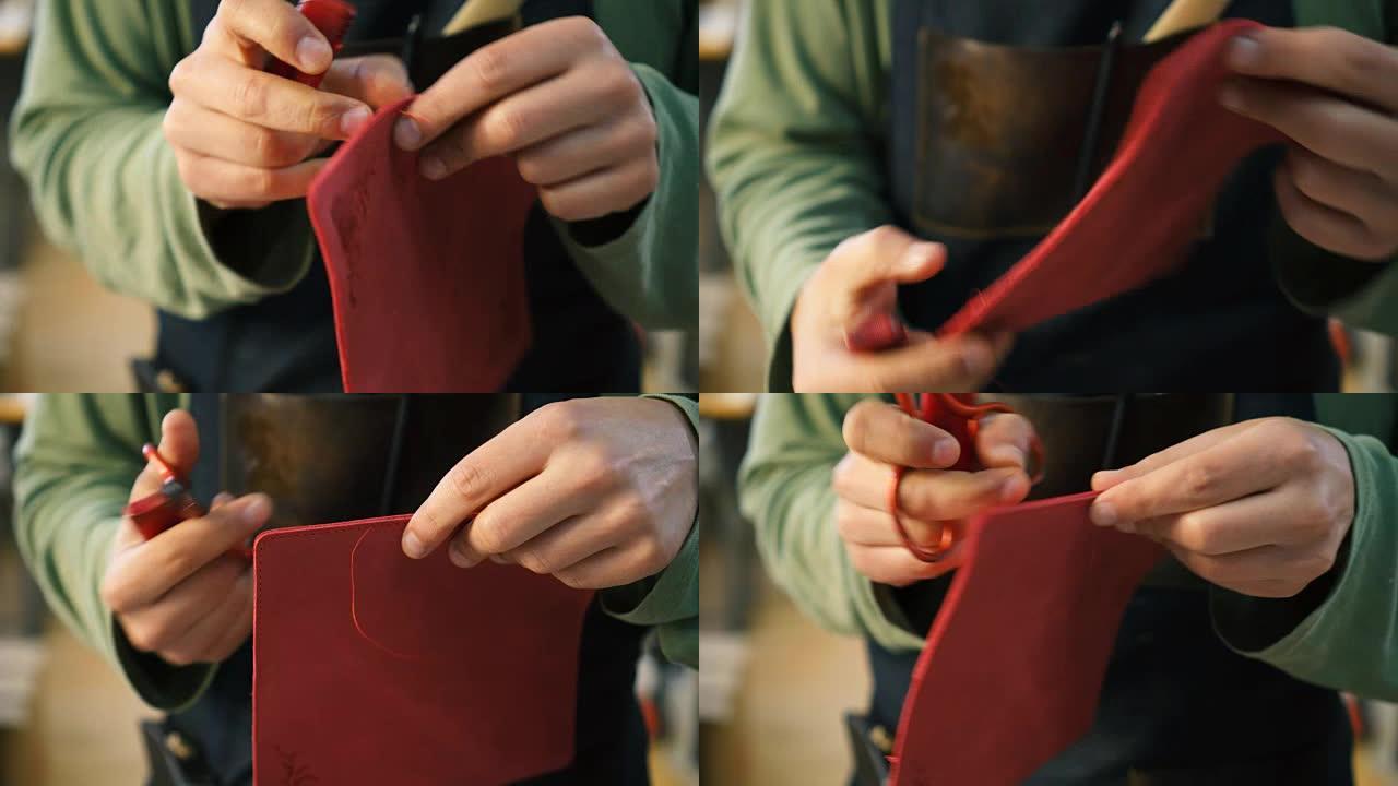 工匠从皮革产品中切割针迹