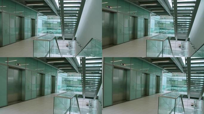 空荡荡的现代办公室走廊，水平平移镜头