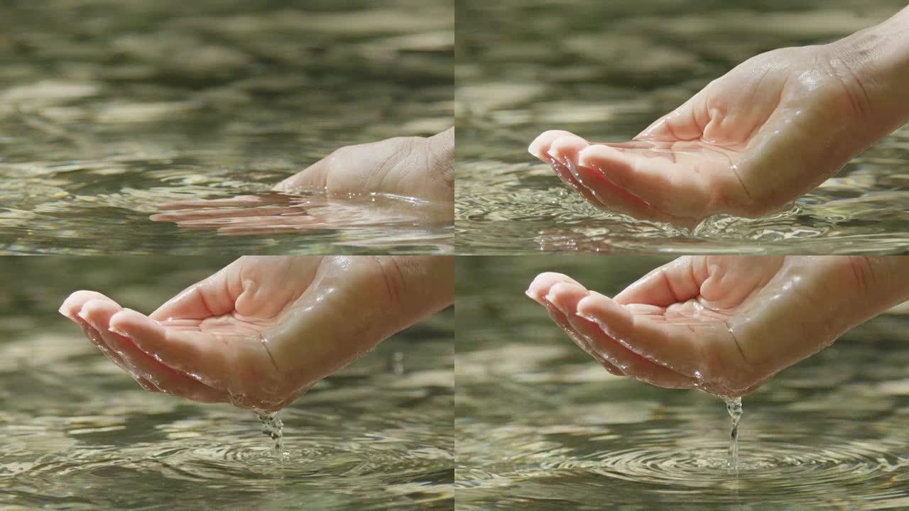 慢动作特写: 手握纯净水