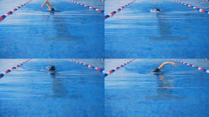 游泳者爬行时靠近相机。