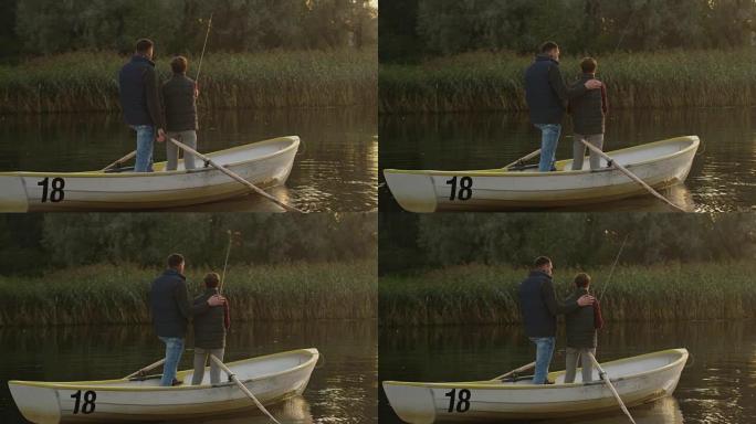 父亲和儿子在钓鱼时站在船上。儿子摆动钓鱼竿。