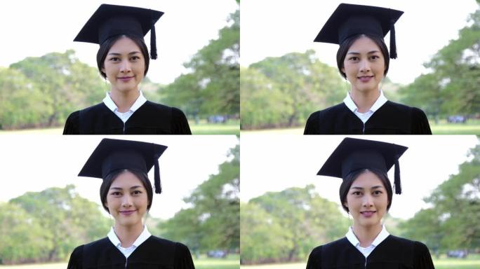 快乐女毕业生。迷人的亚洲年轻女士微笑。