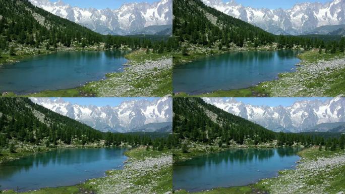 旅游者在美丽的山湖中的时光流逝