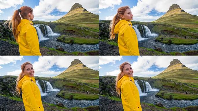 游览冰岛的游客，欣赏其最具标志性的地标之一