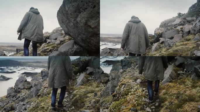 年轻的旅行家在冰岛的Vatnajokull冰泻湖中穿越山脉
