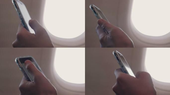 特写: 在飞机上使用智能手机的女人