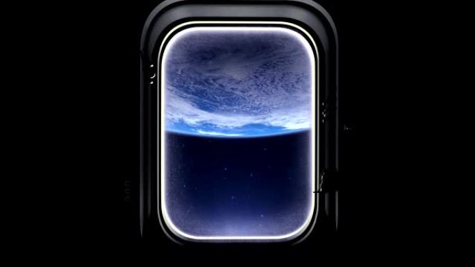 宇宙飞船在地球上空的飞行。通过国际空间站的窗户可以看到地球。