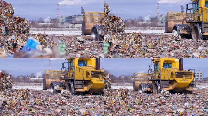 环境污染概念。垃圾填埋场拖拉机在成堆的垃圾附近开走。