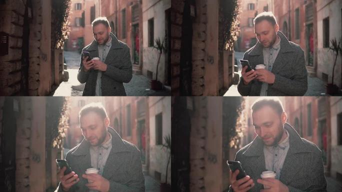 站在小街道上并在智能手机上使用触摸屏技术的英俊男子的肖像