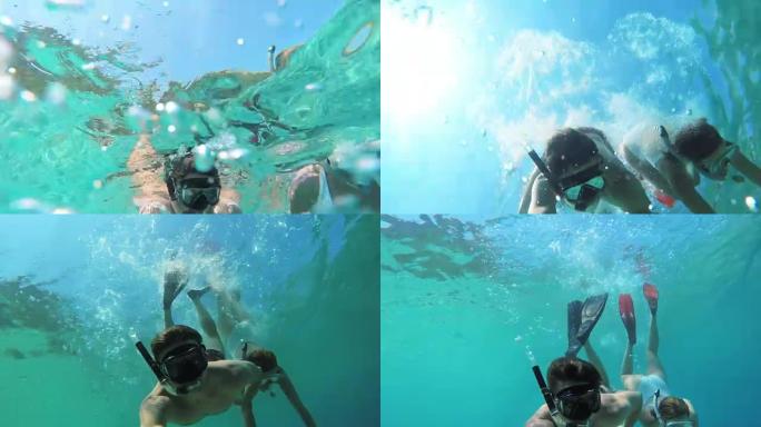MS夫妇与可穿戴相机在蓝色海洋水下浮潜