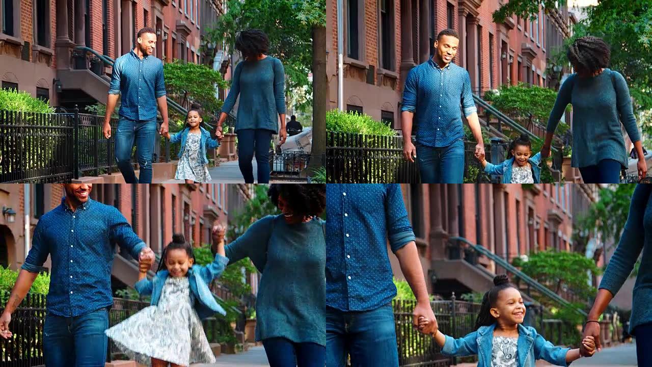 年轻的黑人家庭走在布鲁克林的街道上